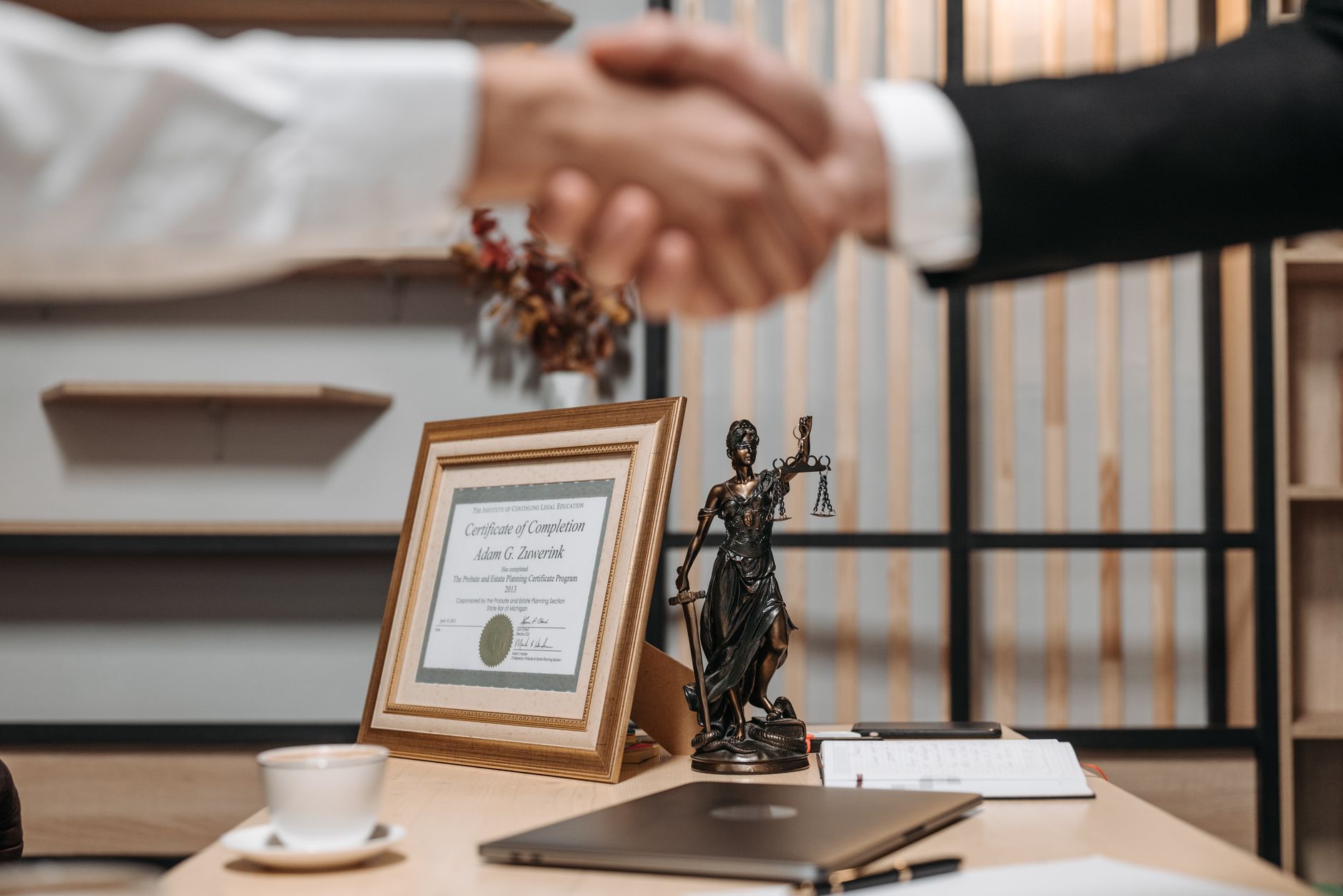 A professional Korean exporter presenting a tablet with compliance certificates to a European buyer in a bright corporate meeting room, confident handshake