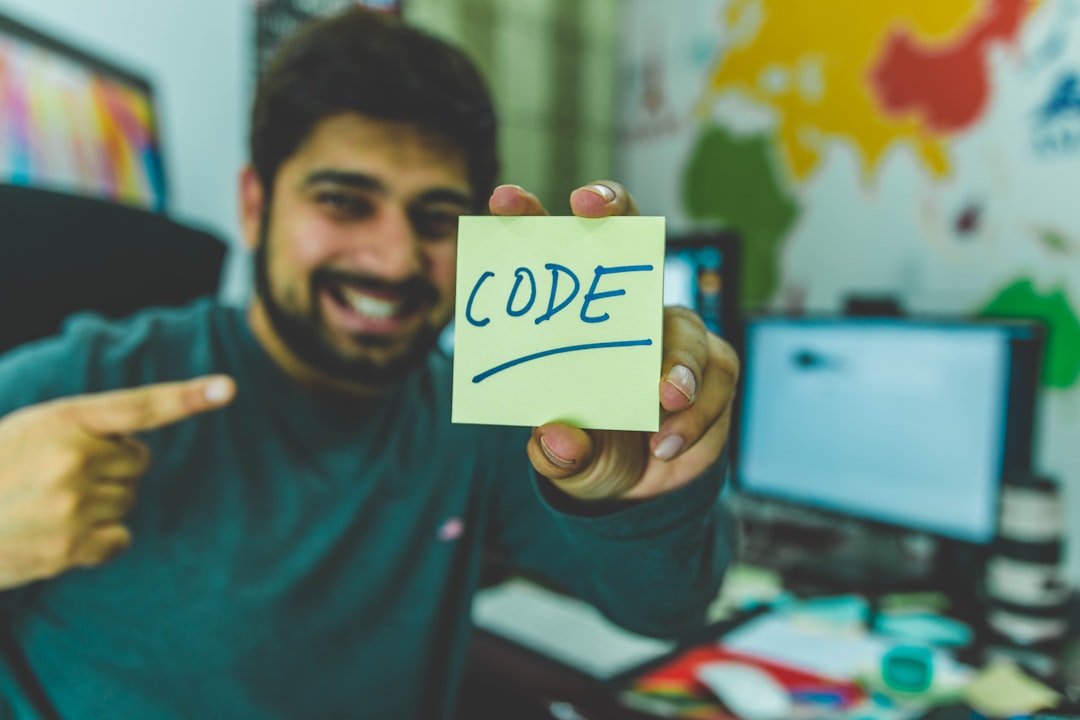 A developer reviewing a simple code snippet on screen, a sticky note on the monitor reads "OpenAI? Anthropic?", looking calm and considering options